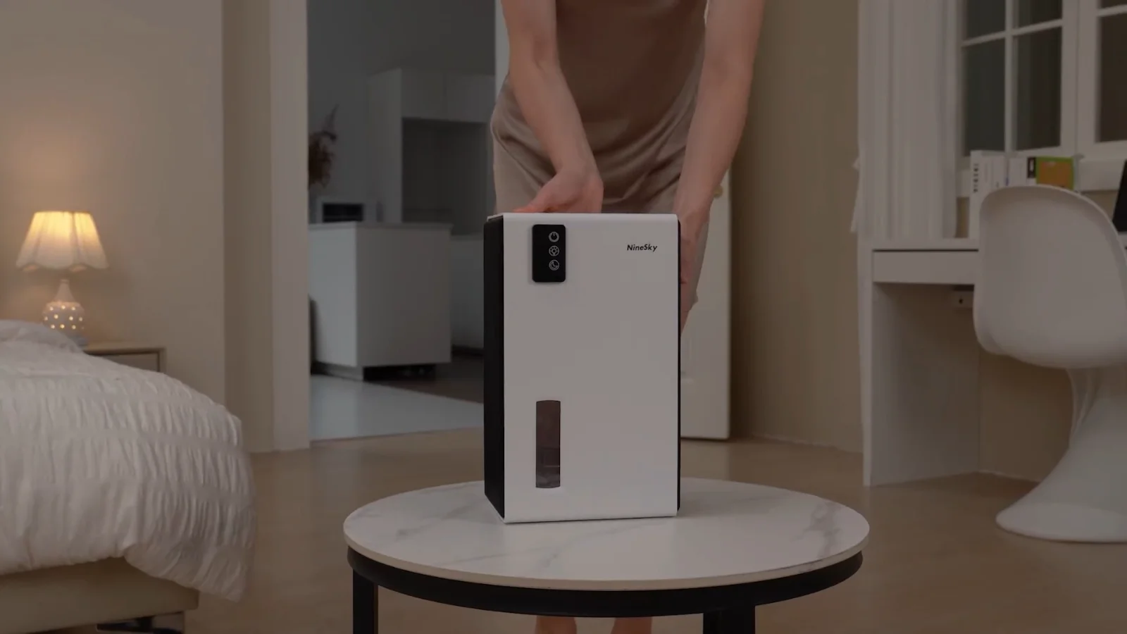 A NineSky CT2 being set down on a bedside table